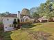 Expansive backyard view featuring a multi-level deck, fenced yard, and lush landscaping for outdoor enjoyment at 1431 Brandy Shoals Se Ct, Conyers, GA 30013