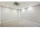 Finished basement area with new carpet and ample space for storage or recreation at 1431 Brandy Shoals Se Ct, Conyers, GA 30013