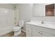 The bathroom features neutral tile, white cabinetry and a tub/shower combo at 1431 Brandy Shoals Se Ct, Conyers, GA 30013