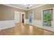 Dining room with chair rail and hardwood floors at 1431 Brandy Shoals Se Ct, Conyers, GA 30013