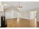 Spacious living room with fireplace and hardwood floors at 1431 Brandy Shoals Se Ct, Conyers, GA 30013