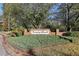 Community entrance sign for Brandy Shoals surrounded by lush greenery, creating a welcoming neighborhood at 1431 Brandy Shoals Se Ct, Conyers, GA 30013