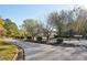 Entrance to the Brandy Shoals community featuring well-maintained street and landscape at 1431 Brandy Shoals Se Ct, Conyers, GA 30013