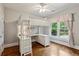 Charming bedroom with a modern loft bed, desk, and bright window with backyard view at 1904 Woodland Hills Nw Ave, Atlanta, GA 30318