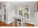 Cozy breakfast nook with a view of the yard, next to a door to outside at 1904 Woodland Hills Nw Ave, Atlanta, GA 30318