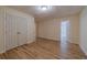 Finished basement with hardwood flooring and large closet at 3365 Preservation Cir, Lilburn, GA 30047