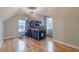 Bedroom with angled ceilings, wood floors and bed with slide at 3365 Preservation Cir, Lilburn, GA 30047