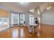 Bright breakfast nook featuring wood floors, a round table, and floor-to-ceiling windows at 3365 Preservation Cir, Lilburn, GA 30047