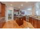 Lovely kitchen with granite countertops, stainless appliances, and hardwood flooring at 3365 Preservation Cir, Lilburn, GA 30047