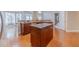 Lovely kitchen with granite countertops, an island, and stainless steel appliances at 3365 Preservation Cir, Lilburn, GA 30047