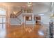 Open concept living room and staircase with hardwood floors and abundant natural light at 3365 Preservation Cir, Lilburn, GA 30047