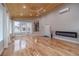 Beautiful sunroom with wood ceiling, hardwood floors, and bright windows at 3365 Preservation Cir, Lilburn, GA 30047