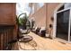 Back porch features comfortable seating, a swing, and decorative lighting at 5360 Brooke Ridge Dr, Dunwoody, GA 30338