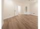Spacious bedroom with laminated wood flooring and bright natural light at 5360 Brooke Ridge Dr, Dunwoody, GA 30338