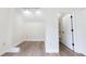Bedroom with laminated wood flooring, recessed ceiling lights and closet space at 5360 Brooke Ridge Dr, Dunwoody, GA 30338