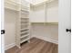 Walk-in closet with organized shelving and ample storage space at 5360 Brooke Ridge Dr, Dunwoody, GA 30338