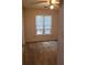 Bright bedroom with neutral carpet, ceiling fan, and a large window bringing in lots of natural light at 1034 Bettina Ct, Mableton, GA 30126