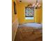 Dining room with carpet, chandelier and window with decorative patterned curtains at 1034 Bettina Ct, Mableton, GA 30126