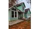Charming two-story home with a brick-accented entrance and attached garage at 1034 Bettina Ct, Mableton, GA 30126