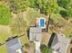 Aerial view of home with backyard oasis including a swimming pool, lush landscaping, and privacy fence at 105 Oakfield Way, Douglasville, GA 30134