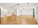 Finished basement with wood-look floors, neutral walls, and multiple access points at 105 Oakfield Way, Douglasville, GA 30134