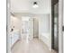 Large bathroom with dual sinks, vanity, glass shower and tub at 105 Oakfield Way, Douglasville, GA 30134