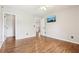 Bright bedroom with wood floors and neutral walls at 105 Oakfield Way, Douglasville, GA 30134