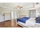 Luxury main bedroom with tray ceilings and ensuite access at 105 Oakfield Way, Douglasville, GA 30134