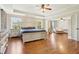 Spacious main bedroom features decorative ceilings and wood floors at 105 Oakfield Way, Douglasville, GA 30134