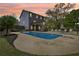 Backyard features an inviting in-ground pool with a spacious deck, perfect for outdoor entertaining at 105 Oakfield Way, Douglasville, GA 30134