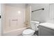 Bathroom featuring a bathtub, shower, toilet, and a gray vanity with a white countertop at 109 Beaver Dam Rd, Peachtree City, GA 30269