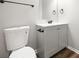 Bathroom with modern vanity, framed mirror, and a standard toilet at 109 Beaver Dam Rd, Peachtree City, GA 30269