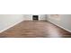 Spacious living room with new flooring, a cozy fireplace, and ample natural light at 109 Beaver Dam Rd, Peachtree City, GA 30269