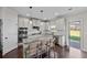 Stylish kitchen with granite countertops, stainless steel appliances and an island at 3048 Level Grove Ln, Dacula, GA 30019