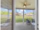 Covered outdoor patio space with comfortable seating, perfect for relaxing and entertaining at 3048 Level Grove Ln, Dacula, GA 30019