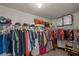 Organized walk-in closet with shelving, hanging rods, and ample storage space at 3048 Level Grove Ln, Dacula, GA 30019