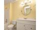 Bathroom with a tub/shower combo, white vanity with sink and a mirrored medicine cabinet at 4186 Argonne Dr, Villa Rica, GA 30180