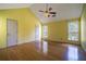 Spacious bedroom with high ceilings, hardwood floors, two windows and ceiling fan at 4186 Argonne Dr, Villa Rica, GA 30180