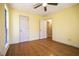 Bedroom featuring hardwood floors, a bright window and door to another room at 4186 Argonne Dr, Villa Rica, GA 30180