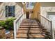 Charming front entrance with a Ring security system and long stair case at 4186 Argonne Dr, Villa Rica, GA 30180