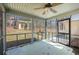 Relaxing screened patio with views of the backyard and mature trees at 4186 Argonne Dr, Villa Rica, GA 30180