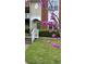 Inviting two-story condo featuring a well-maintained lawn and charming green door with decorative wreath at 1731 Pryor Sw Rd # 108, Atlanta, GA 30315