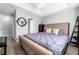 Well lit primary bedroom with neutral wall paint and carpet and decorated with large bed at 1731 Pryor Sw Rd # 108, Atlanta, GA 30315