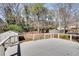 Large backyard deck with view of basketball court and storage building at 1861 Dyer Cir, Atlanta, GA 30341