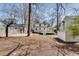 Large backyard showcases a basketball court, deck, and shed with ample space for entertaining at 1861 Dyer Cir, Atlanta, GA 30341