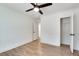 Bedroom with hardwood floors, closet, ceiling fan and access to the bathroom at 1861 Dyer Cir, Atlanta, GA 30341