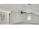 Bonus room with a ceiling fan, lots of light, carpet and a vaulted ceiling at 1861 Dyer Cir, Atlanta, GA 30341