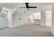 Bonus room with a ceiling fan, lots of light, carpet and a vaulted ceiling at 1861 Dyer Cir, Atlanta, GA 30341