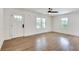 Inviting living room with lots of natural light, hardwood floors and modern fixtures at 1861 Dyer Cir, Atlanta, GA 30341