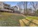 Expansive backyard featuring a multi-level deck and lush green grass, perfect for outdoor activities and relaxation at 4519 Glenforest Ne Dr, Roswell, GA 30075